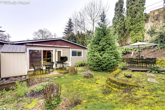 view of yard featuring a wooden deck