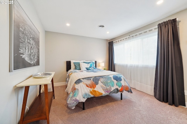 bedroom featuring visible vents, recessed lighting, baseboards, and carpet