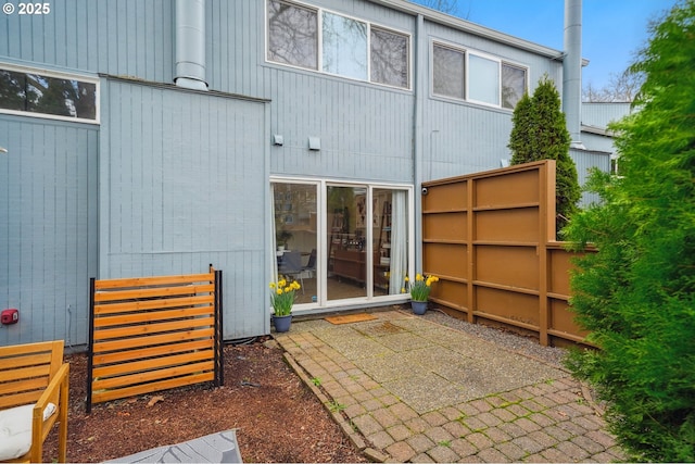 rear view of house featuring a patio area