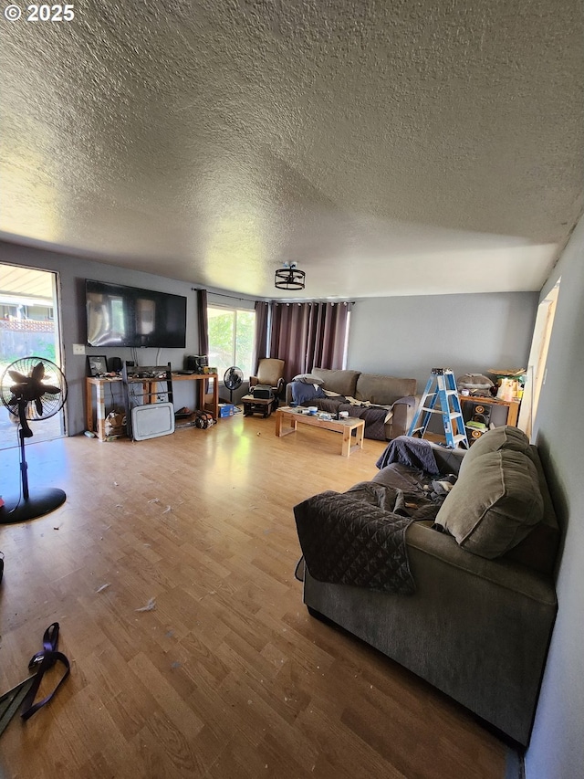 3660 Carnes Rd, Roseburg, OR 97471 - living area featuring a textured ceiling and wood finished floors