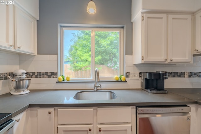 17474 SW Sarala St, Beaverton, OR 97007 - kitchen featuring stainless steel dishwasher, white cabinetry, tasteful backsplash, and a sink