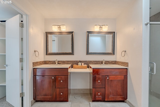 17474 SW Sarala St, Beaverton, OR 97007 - bathroom with two vanities, a stall shower, and tile patterned flooring
