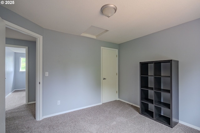 17474 SW Sarala St, Beaverton, OR 97007 - unfurnished bedroom with carpet floors, attic access, and baseboards