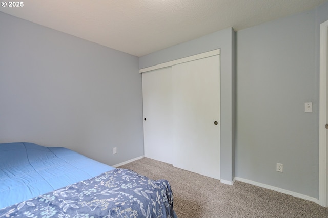 17474 SW Sarala St, Beaverton, OR 97007 - carpeted bedroom featuring a closet and baseboards