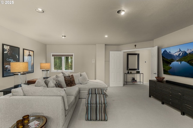 carpeted living room featuring recessed lighting