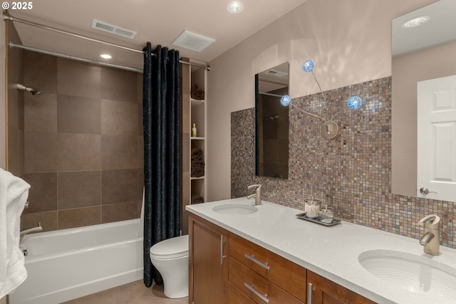 full bathroom with a sink, visible vents, and tasteful backsplash