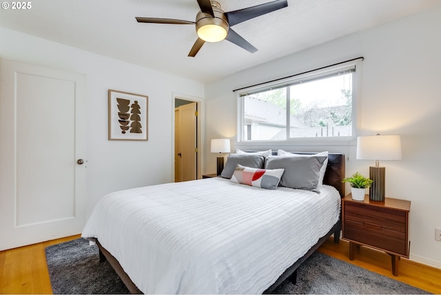 1917 SE 51st Ave, Portland, OR 97215 - bedroom with a ceiling fan and wood finished floors