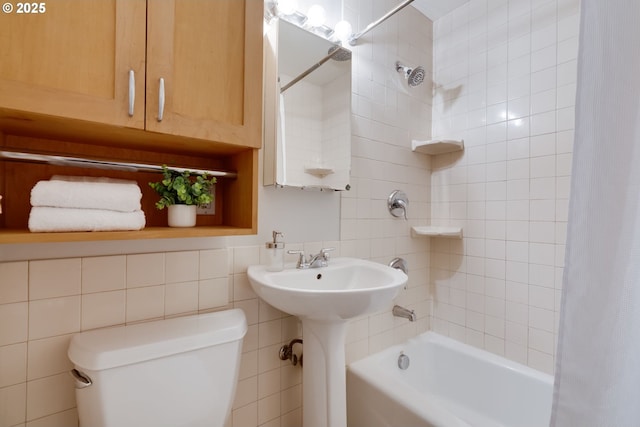 1917 SE 51st Ave, Portland, OR 97215 - bathroom with a sink, tile walls, toilet, and shower / tub combo