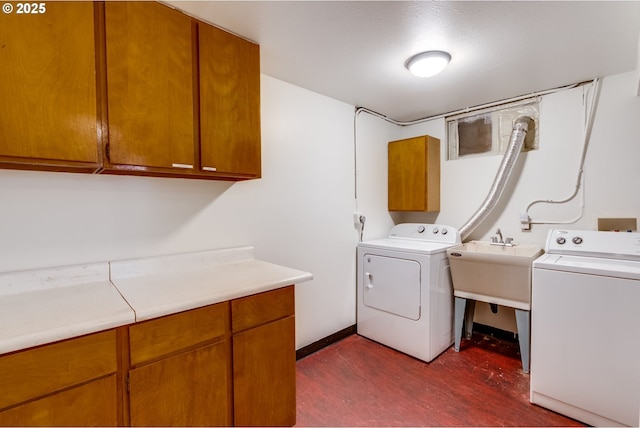 1917 SE 51st Ave, Portland, OR 97215 - laundry area featuring baseboards, cabinet space, independent washer and dryer, and dark wood-style floors