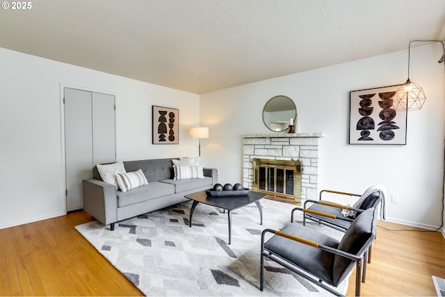1917 SE 51st Ave, Portland, OR 97215 - living area with a fireplace and wood finished floors