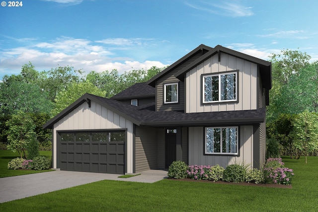 view of front of property featuring a front lawn and a garage