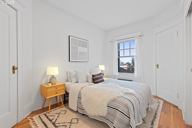 bedroom with light wood-type flooring