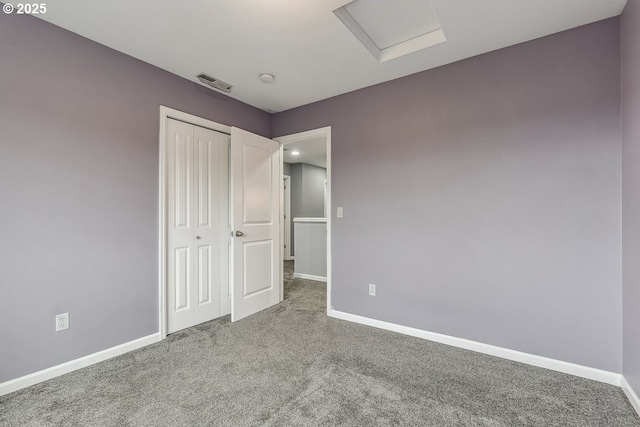 1073 Goff Rd, Forest Grove, OR 97116 - unfurnished bedroom with visible vents, a closet, baseboards, attic access, and carpet