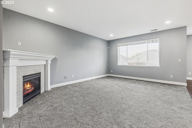 1073 Goff Rd, Forest Grove, OR 97116 - unfurnished living room featuring recessed lighting, carpet, and a tile fireplace