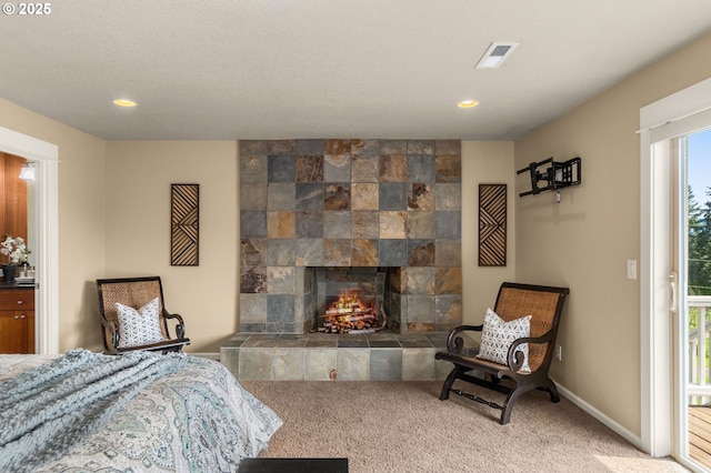 carpeted bedroom with visible vents, recessed lighting, baseboards, and access to exterior