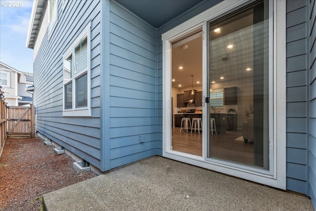 property entrance featuring fence