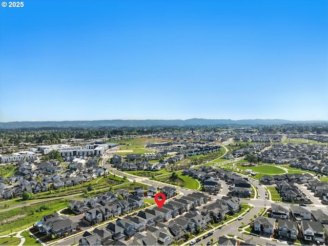 aerial view with a mountain view and a residential view