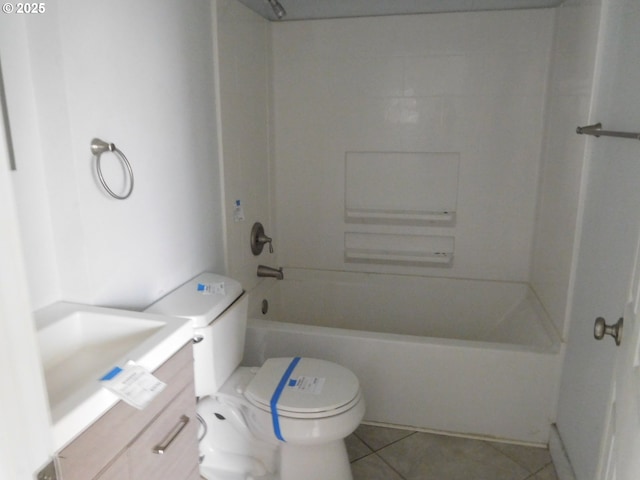 full bathroom featuring vanity, tile patterned floors, toilet, and bathtub / shower combination