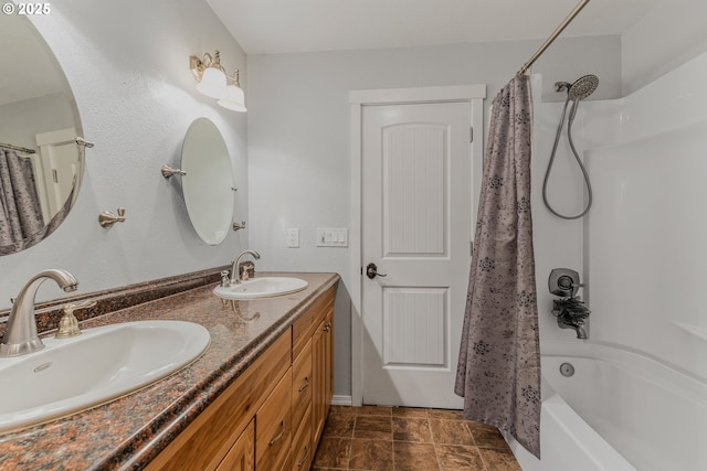 bathroom featuring vanity and shower / bath combination with curtain