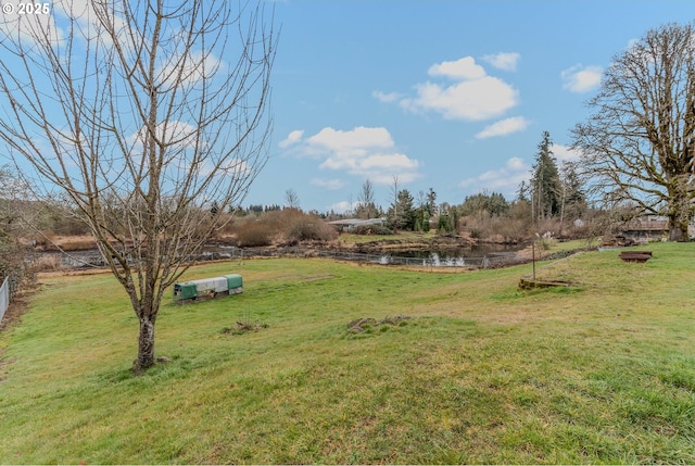 view of yard with a water view