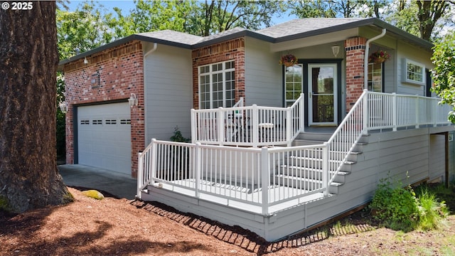 690 N Shepherd Rd, Washougal, WA 98671 - view of front of property featuring brick siding, covered porch, dirt driveway, and a garage