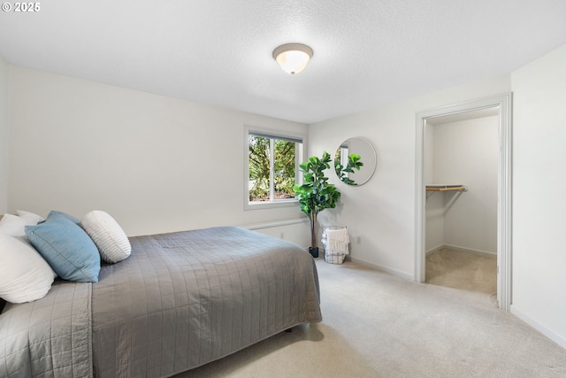 690 N Shepherd Rd, Washougal, WA 98671 - bedroom with carpet floors, baseboards, and a textured ceiling
