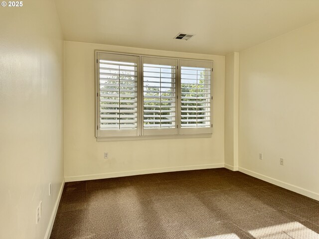 821 NW 11th Ave Unit 315, Portland, OR 97209 - empty room featuring carpet floors and baseboards