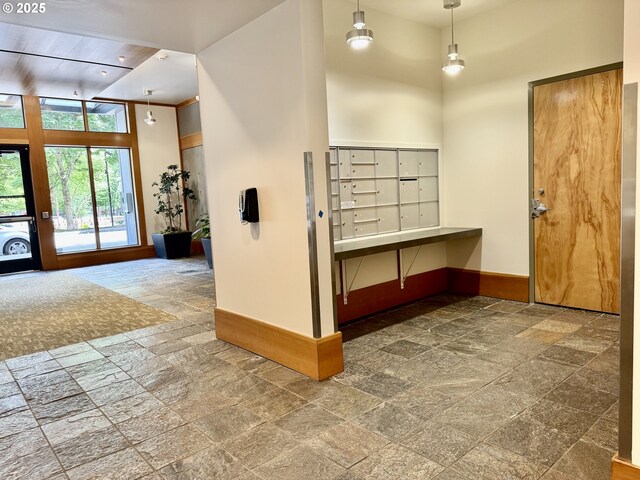 821 NW 11th Ave Unit 315, Portland, OR 97209 - surrounding community with a towering ceiling and mail area