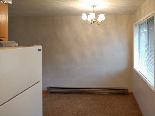 923 S Fir St, Salem, OR 97302 - unfurnished dining area with a chandelier, a baseboard radiator, carpet floors, and baseboards