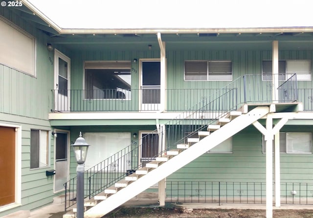 923 S Fir St, Salem, OR 97302 - view of side of home with stairs and board and batten siding