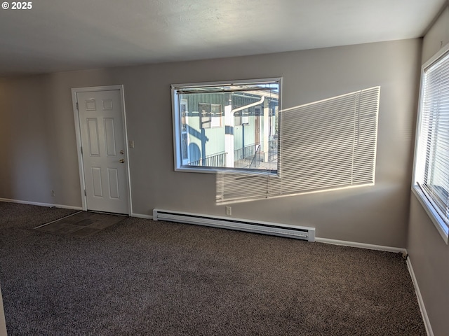 923 S Fir St, Salem, OR 97302 - empty room featuring baseboard heating, carpet, and healthy amount of natural light
