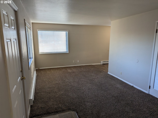 923 S Fir St, Salem, OR 97302 - unfurnished room with dark colored carpet, baseboard heating, and baseboards