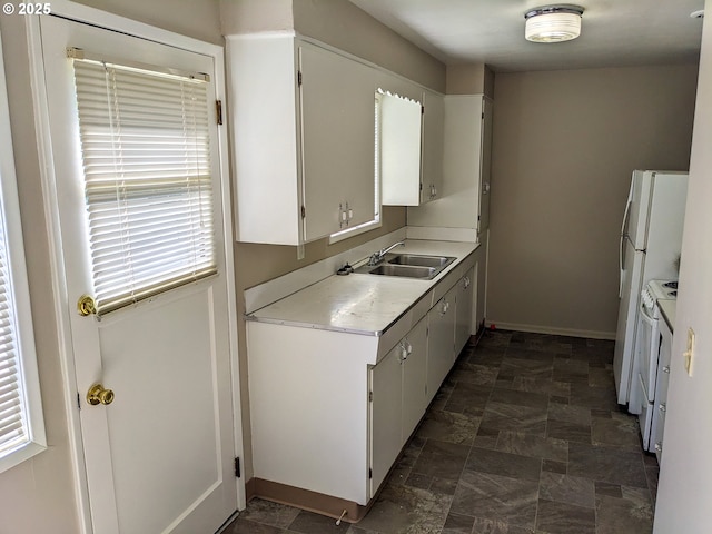 923 S Fir St, Salem, OR 97302 - kitchen with a sink, light countertops, electric range, and white cabinets