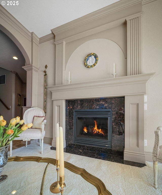 6147 Quail Hollow St, Salem, OR 97306 - detailed view of carpet flooring, ornate columns, a high end fireplace, crown molding, and arched walkways