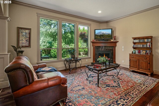 6147 Quail Hollow St, Salem, OR 97306 - living room featuring crown molding, wood finished floors, a fireplace, and recessed lighting