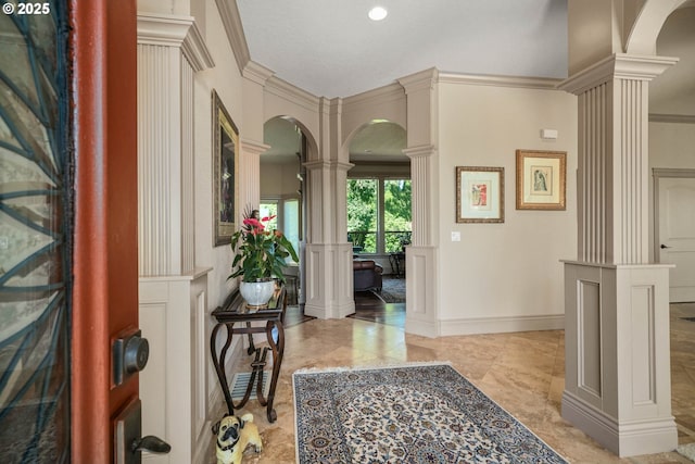 6147 Quail Hollow St, Salem, OR 97306 - foyer entrance with ornate columns, arched walkways, marble tiled floors, and ornamental molding
