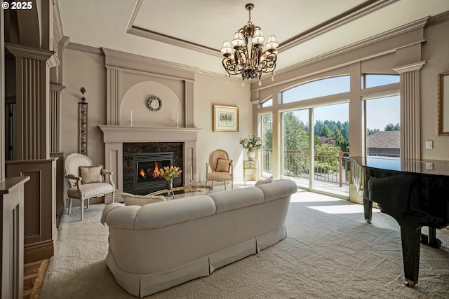 6147 Quail Hollow St, Salem, OR 97306 - living room featuring ornamental molding, a high end fireplace, a chandelier, carpet, and a raised ceiling