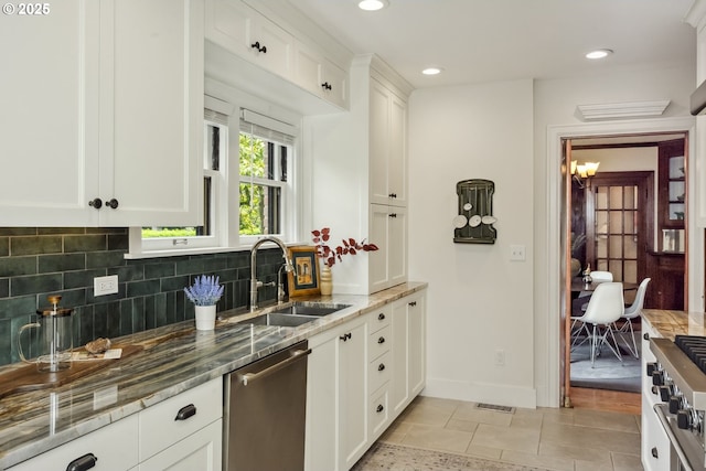 3622 NE Hassalo St, Portland, OR 97232 - kitchen featuring dishwasher, backsplash, light stone counters, white cabinets, and recessed lighting