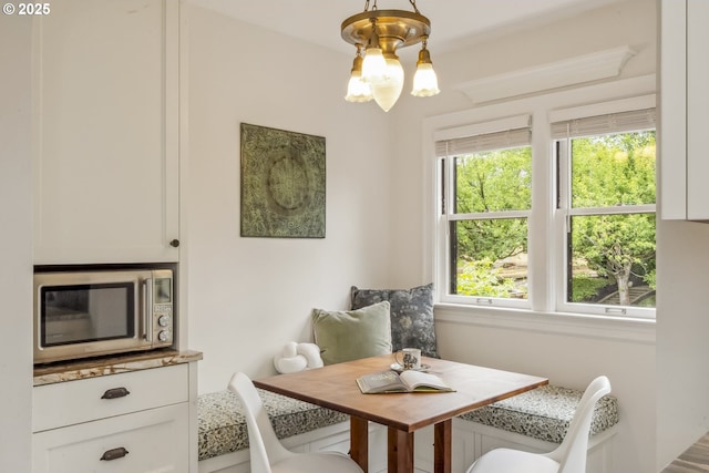 3622 NE Hassalo St, Portland, OR 97232 - dining space with a chandelier and breakfast area