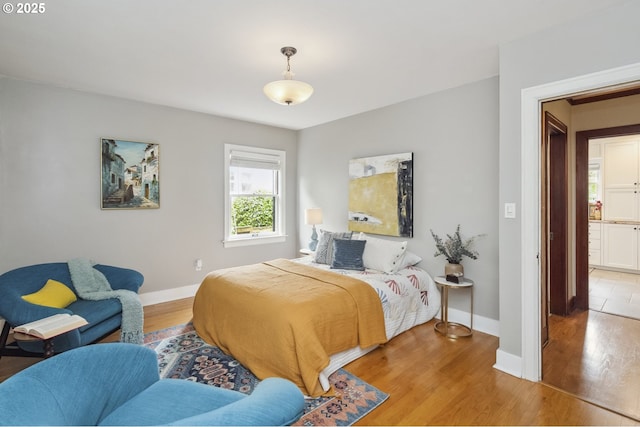 3622 NE Hassalo St, Portland, OR 97232 - bedroom with wood finished floors and baseboards