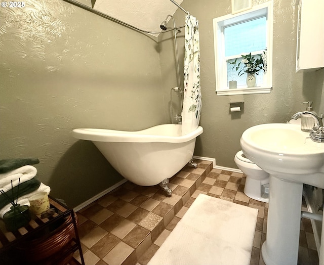 632 SW Utah St, Camas, WA 98607 - bathroom featuring a freestanding tub and a shower with shower curtain
