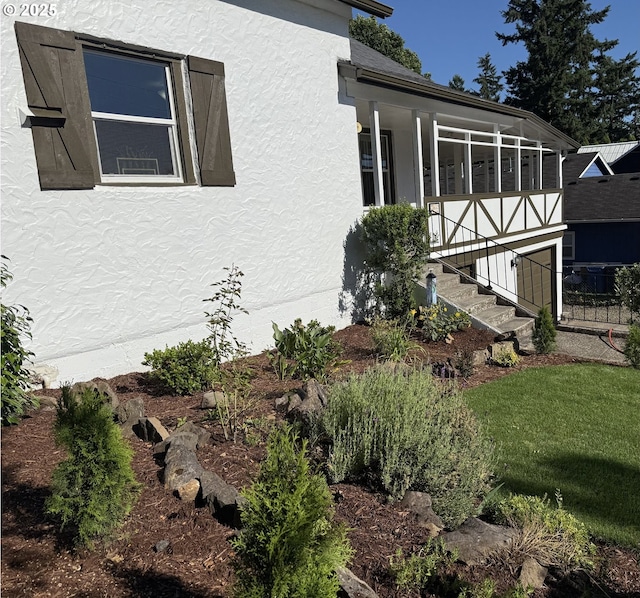 632 SW Utah St, Camas, WA 98607 - view of side of property with stucco siding, a lawn, and stairs