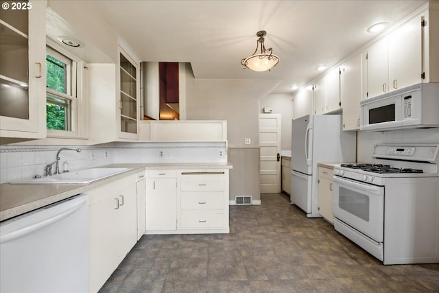 4623 SW Garden Home Rd, Portland, OR 97219 - kitchen with white appliances, a sink, light countertops, white cabinetry, and stone finish floors