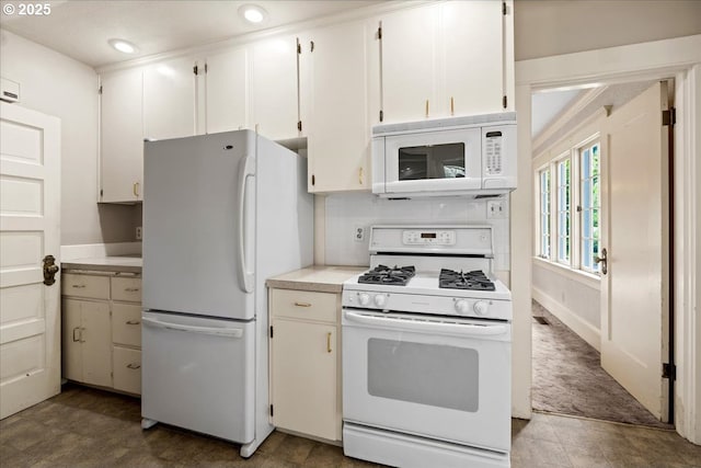 4623 SW Garden Home Rd, Portland, OR 97219 - kitchen with white appliances, light countertops, white cabinets, and recessed lighting