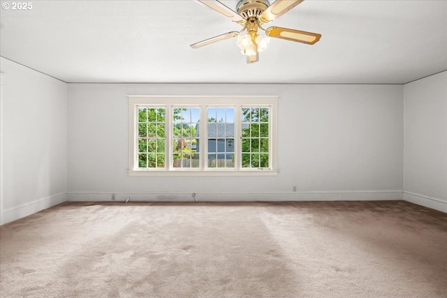 4623 SW Garden Home Rd, Portland, OR 97219 - carpeted spare room with baseboards and ceiling fan