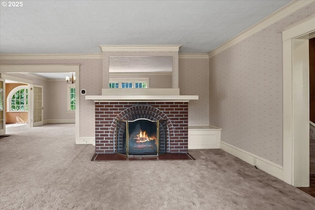 4623 SW Garden Home Rd, Portland, OR 97219 - unfurnished living room with carpet flooring, ornamental molding, a brick fireplace, a chandelier, and wallpapered walls