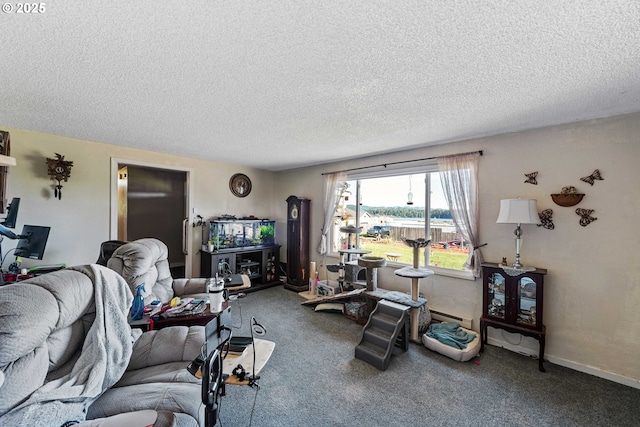 carpeted living room with a baseboard heating unit and a textured ceiling