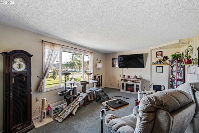 carpeted living room featuring a textured ceiling