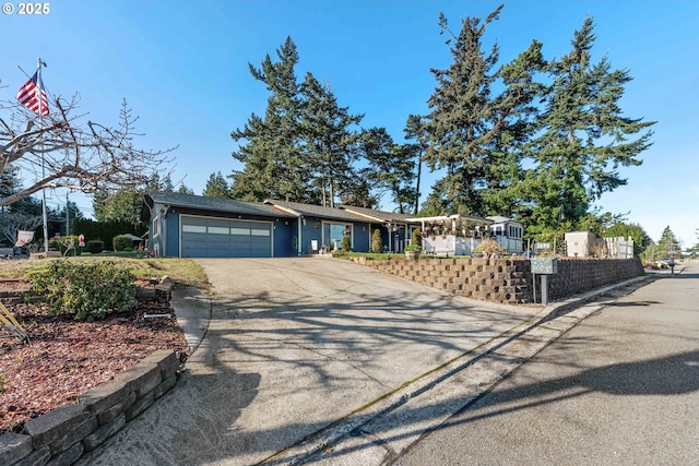 ranch-style home featuring a garage