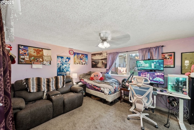 carpeted bedroom with ceiling fan and a textured ceiling